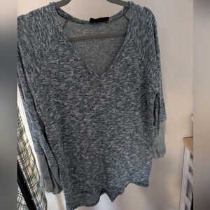 Long sleeve shirt with sleeves detailing. Size medium